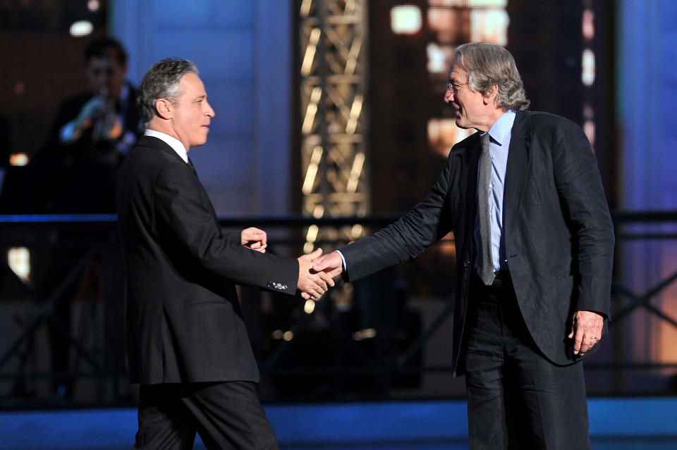 NEW YORK, NY - APRIL 28:  (L-R) Jon Stewart and Robert De Niro speak onstage at The Comedy Awards 2012 at Hammerstein Ballroom on April 28, 2012 in New York City.  (Photo by Theo Wargo/Getty Images)