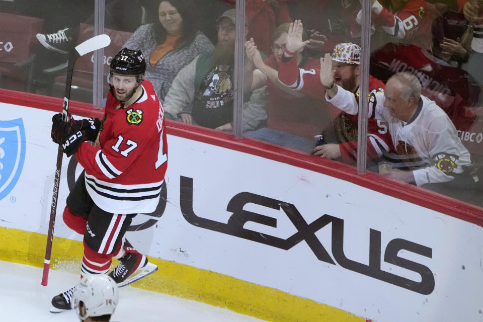 Chicago Blackhawks' Jason Dickinson looks back at the net after scoring during the second period of an NHL hockey game against the Anaheim Ducks Tuesday, Feb. 7, 2023, in Chicago. (AP Photo/Charles Rex Arbogast)