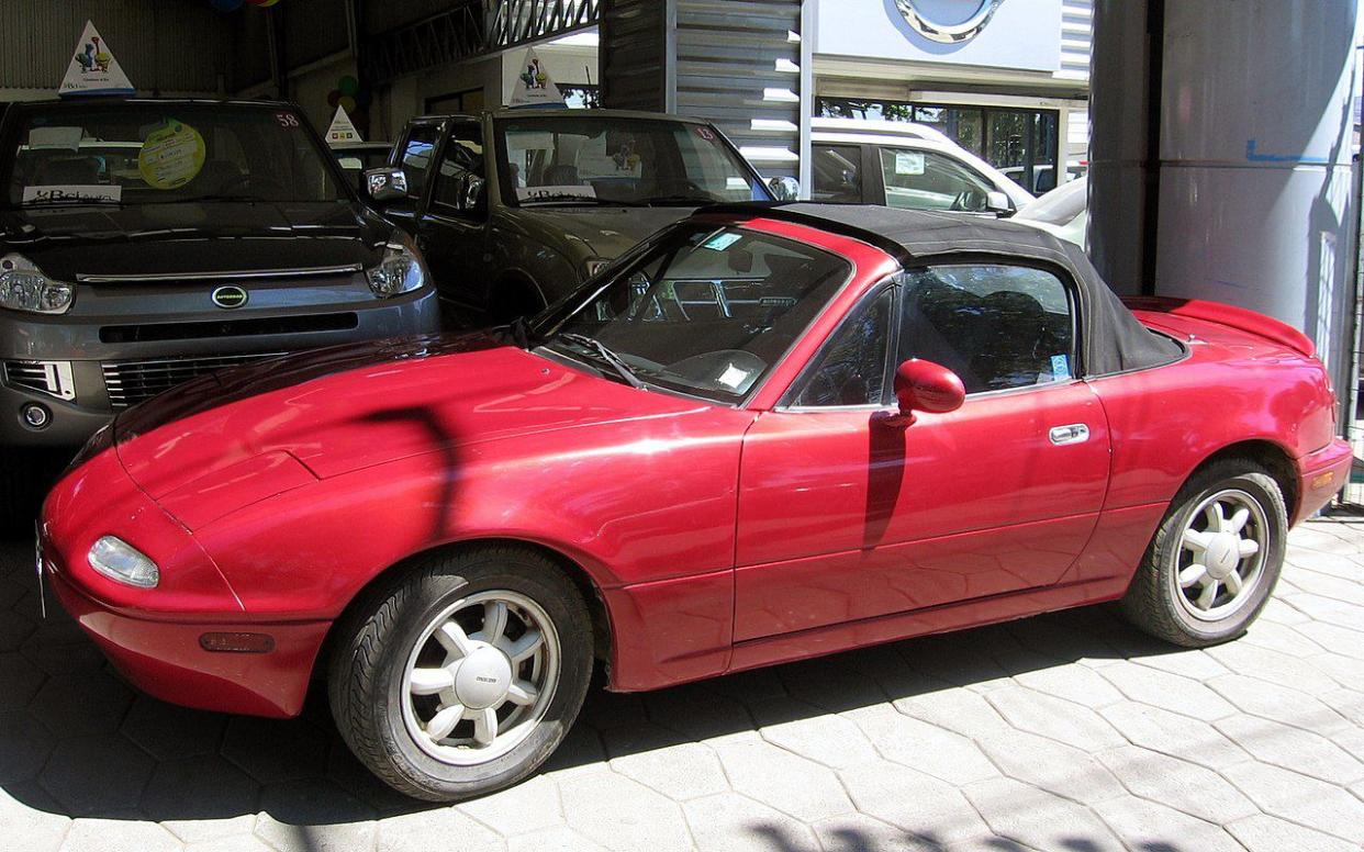 Red Mazda MX-5 Miata 1996