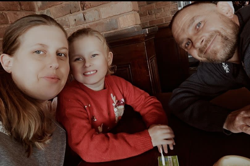 Caitlin-Mae with her parents Laura Hale and Brett Stanley