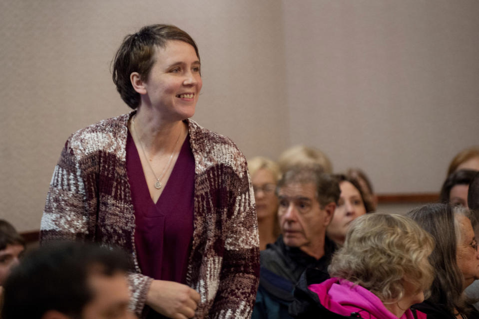 Tiffany Kosakowski appears before Judge Curt Benson at the Kent County Courthouse on Thursday, April 18, 2019 in Grand Rapids, Mich. Kosakowski pleaded guilty to reckless driving for running over her 9-year-old son while dropping him off at school and has been ordered to serve 30 days in jail. Benson sentenced her Thursday to 6 months in jail, with all but 30 days suspended. He called her actions "simply inexcusable." (Neil Blake/The Grand Rapids Press via AP)