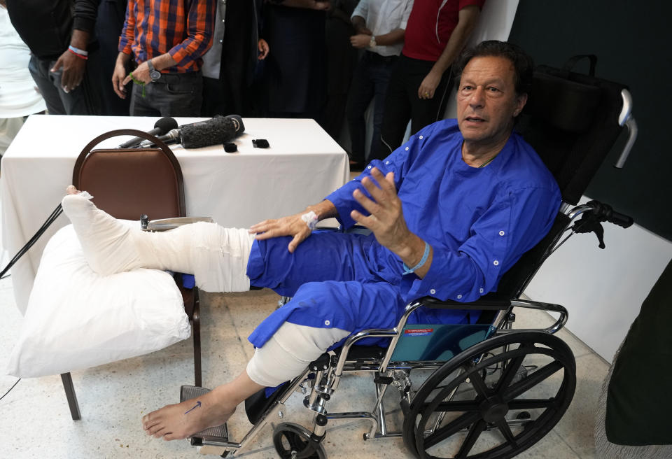 Former Pakistani Prime Minister Imran Khan speaks during a news conference in Shaukat Khanum hospital, where is being treated for a gunshot wound in Lahore, Pakistan, Friday, Nov. 4, 2022. Khan's protest march and rallies were peaceful until the afternoon attack on Thursday, when a gunman opened fire at his campaign truck. The shooting has raised concerns about growing political instability in Pakistan, a country with a history of political violence and assassinations. (AP Photo/K.M. Chaudhry)