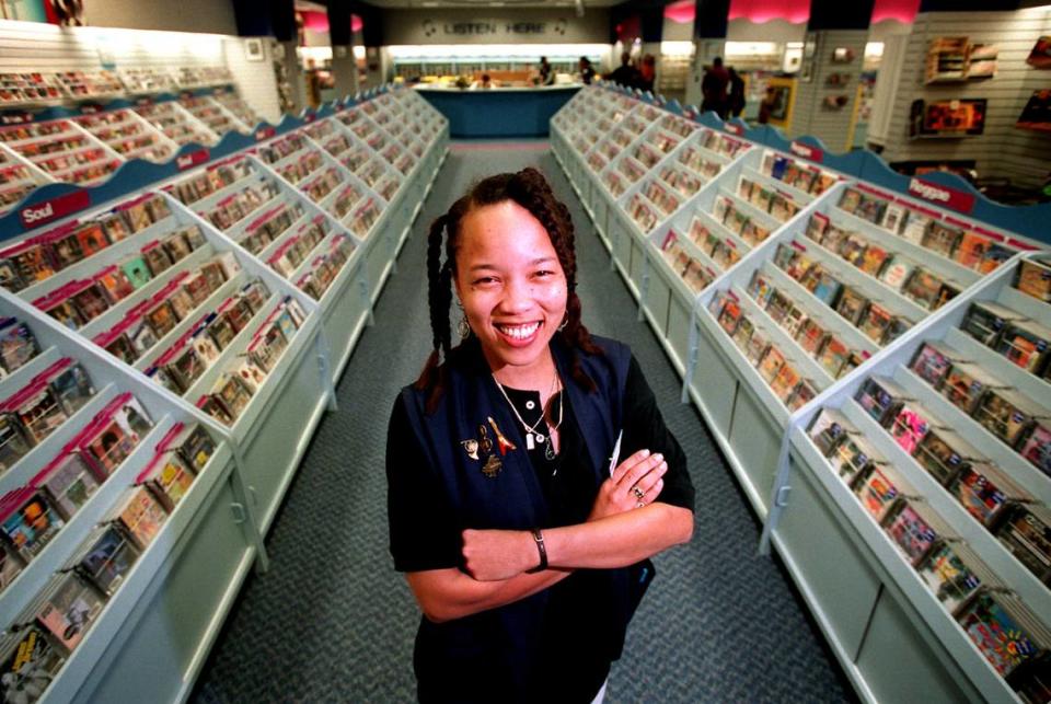 Inthis file photo from June 30, 1995, Jeanean Lockett, an employee of Spec’s Music at the 163rd Street Mall, showed off the new 8,000- square-foot store, which was 6,500-square-feet bigger than the old store, which had been in the mall since the early 1980s.