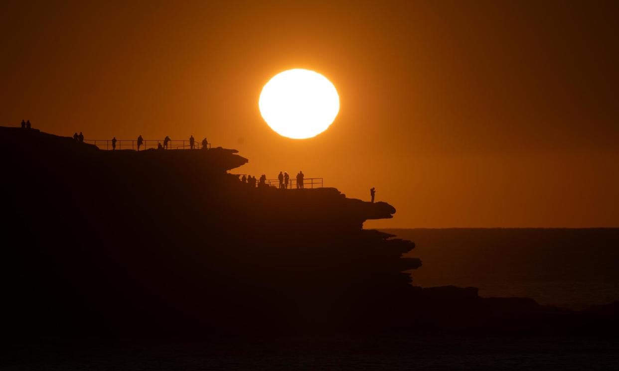 <span>The sun rises over North Bondi as the BoM says Sydney’s temperatures have been ‘way above’ averages for August.</span><span>Photograph: Mike Bowers/The Guardian</span>