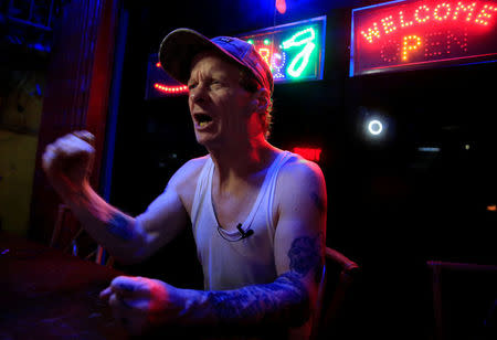 American Christopher Lamb, 48, answers questions during a Reuters interview outside a bar in Subic, north of Manila, Philippines November 10, 2017. REUTERS/Romeo Ranoco