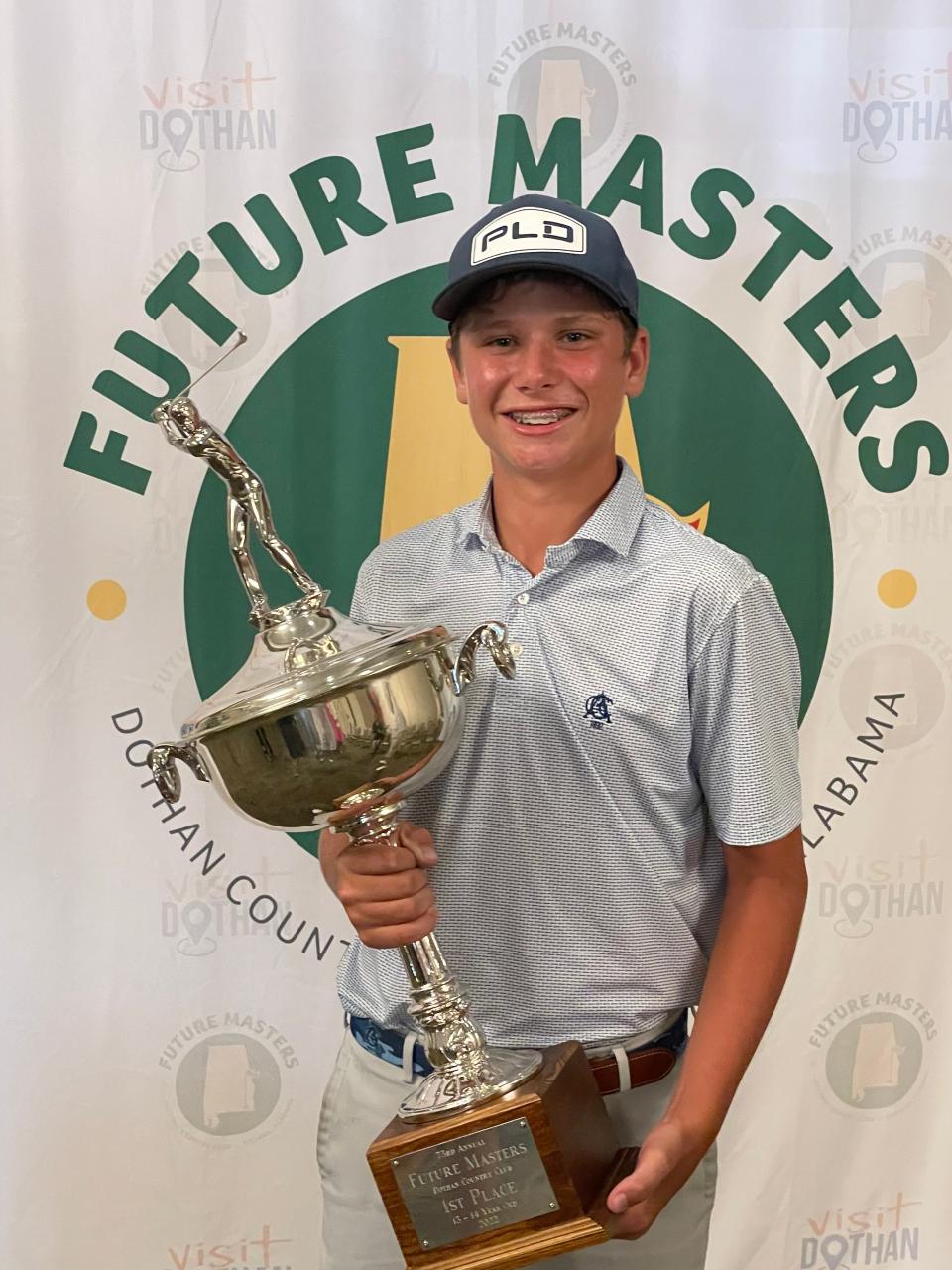 Mason Howell holds the Press Thornton Future Masters first-place trophy in Dothan, Alabama, June 21, 2022