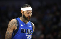 Dallas Mavericks center Willie Cauley-Stein (33) enters the game against the Phoenix Suns during the first half of an NBA basketball game Tuesday, Jan. 28, 2020, in Dallas. (AP Photo/Ron Jenkins)