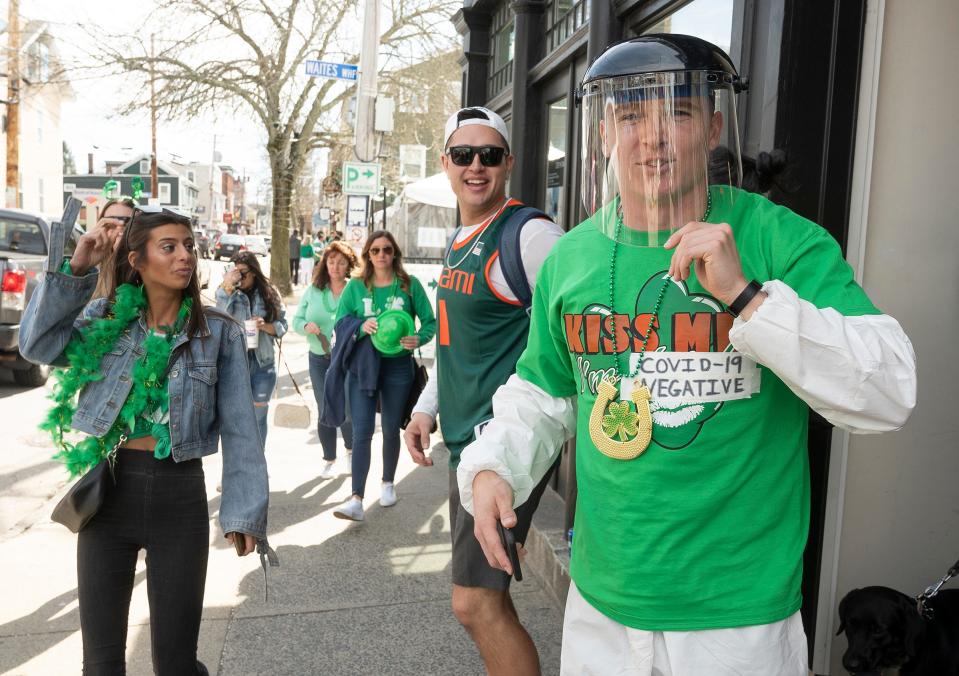 Aaron Brown, of Newport, R.I., was among the partygoers who ventured downtown despite the fact the Newport St. Patrick's Day Parade was canceled because of the coronavirus concerns last March.