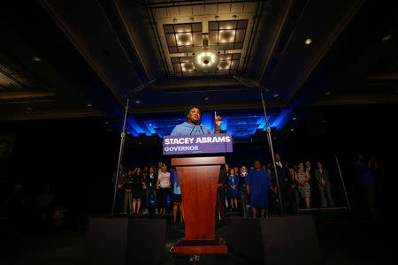 Stacey Abrams speaks to the crowd of supporters announcing they will wait till the morning for results of the mid-terms election at the Hyatt Regency in Atlanta, Georgia, U.S. November 7, 2018. REUTERS/Lawrence Bryant