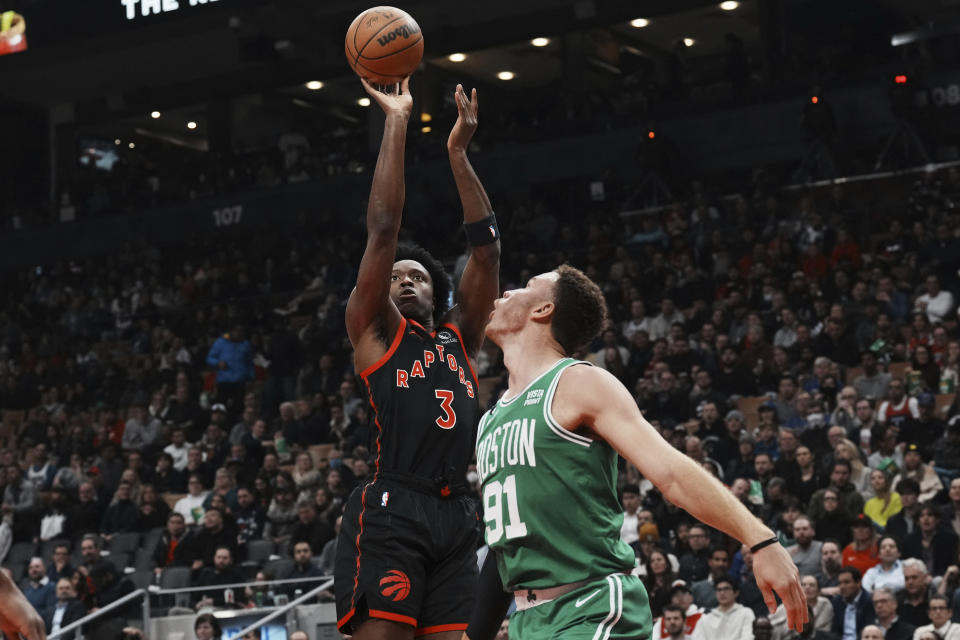 Toronto Raptors O.G. Anunoby (3) shoots on Boston Celtics Blake Griffin during the first half of an NBA basketball game in Toronto, Monday, Dec. 5, 2022. (Chris Young/The Canadian Press via AP)