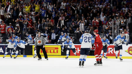 Ice Hockey World Championships - Semifinals - Russia v Finland - Ondrej Nepela Arena, Bratislava, Slovakia - May 25, 2019 Finland's players celebrate after winning the match. REUTERS/David W Cerny