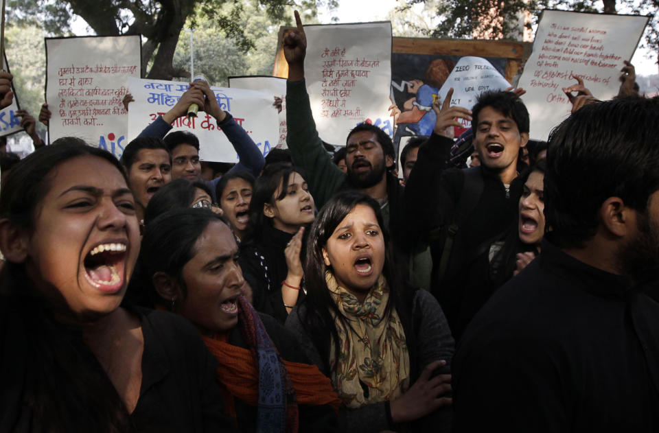 Indian people shout slogans during a protest in New Delhi, India, Monday, Dec. 31, 2012. (AP Photo/Manish Swarup)