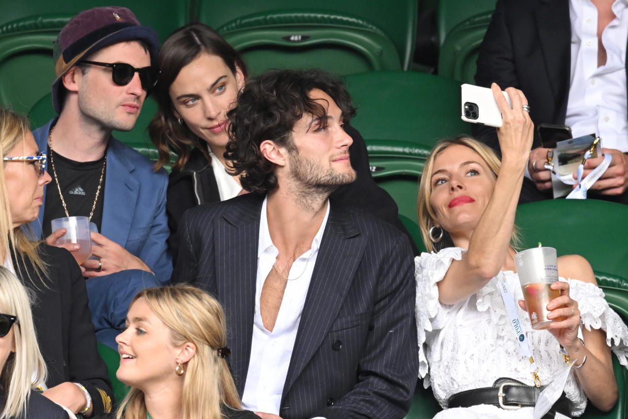 The two couples posed for a selfie at one point. (Getty Images)