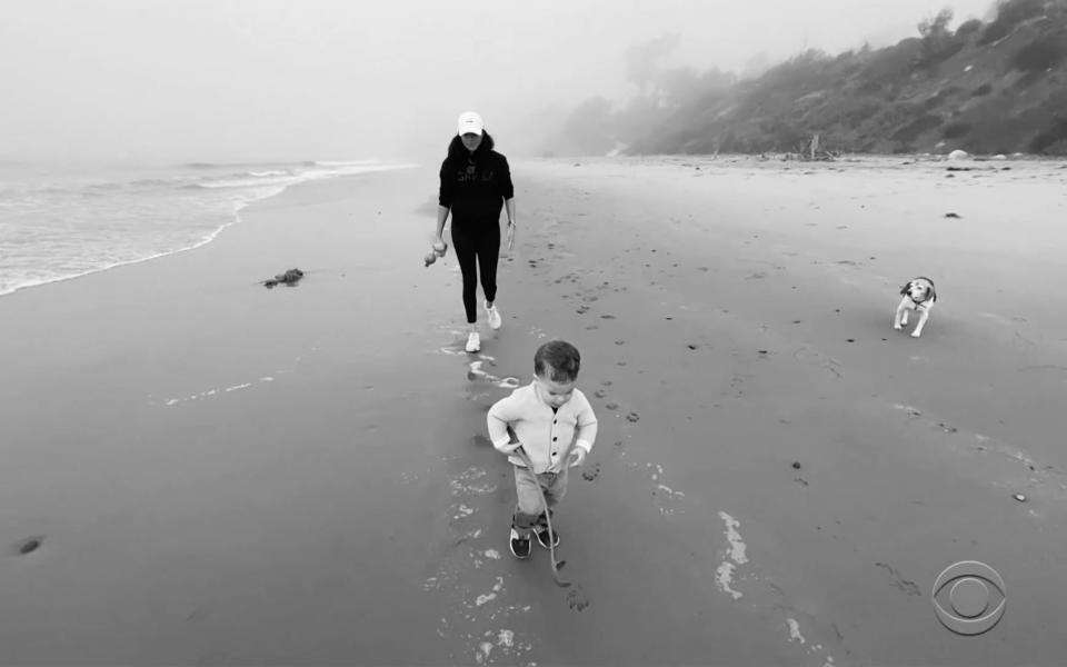 Archie plays on the beach in the US