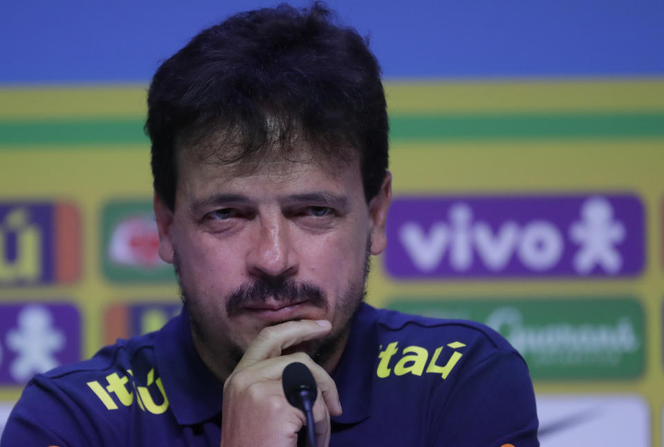 Brazil soccer coach Fernando Diniz gestures after announcing his squad for the upcoming World Cup 2026 qualifying matches against Bolivia and Peru in Rio de Janeiro, Brazil, Friday, Aug. 18, 2023. (AP Photo/Bruna Prado)