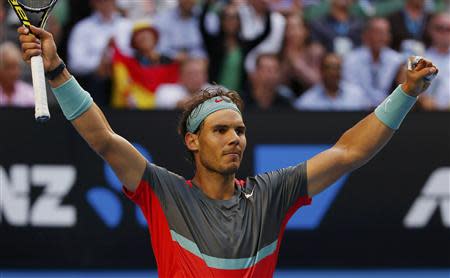 Rafael Nadal of Spain celebrates defeating Kei Nishikori of Japan during their men's singles match at the Australian Open 2014 tennis tournament in Melbourne January 20, 2014. REUTERS/Petar Kujundzic