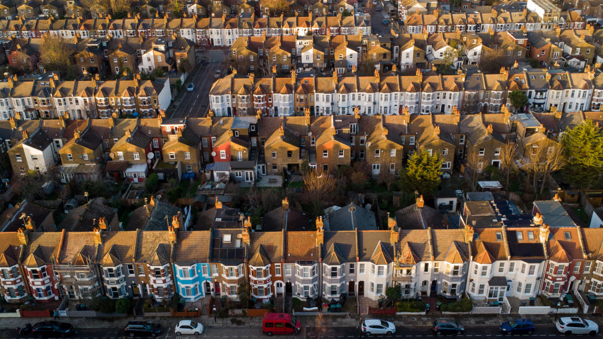 mortgage  LONDON, UNITED KINGDOM - DECEMBER 20: An aerial view of terraced houses in north London, Britain on December 20, 2022. The UK Government is extending the mortgage guarantee scheme for first-time home buyers or those with small deposits until the end of 2023. Halifax is predicting an 8 per cent decline in house prices in 2023. (Photo by Dinendra Haria/Anadolu Agency via Getty Images)
