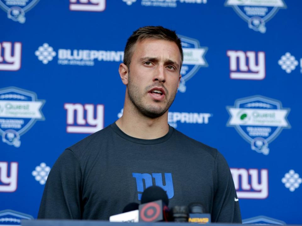 Kyle Lauletta speaks to reporters at Giants training camp in 2018.