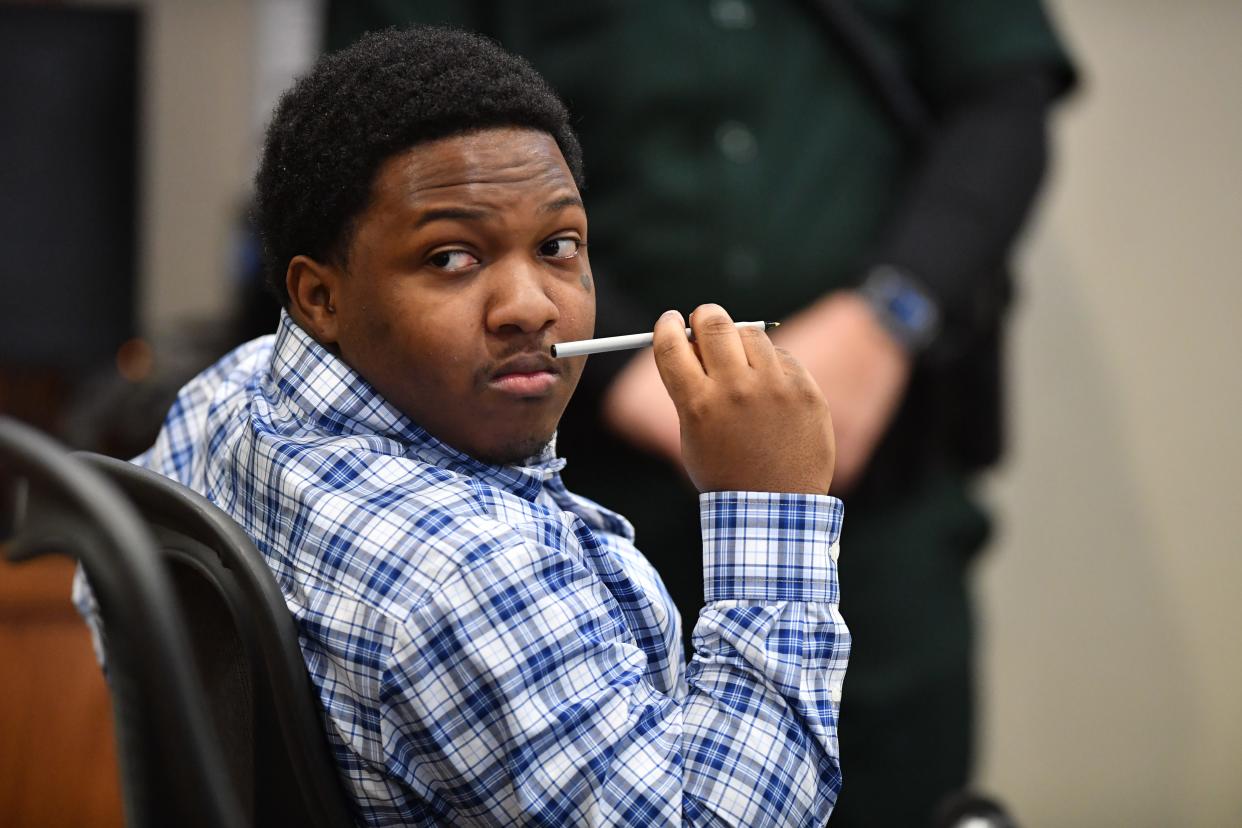 Nyquan Priester looks around the courtroom before the start of his trial Tuesday in Sarasota. Priester has been charged with 2nd degree murder in connection with a shooting at Ackerman Park in December 2021.