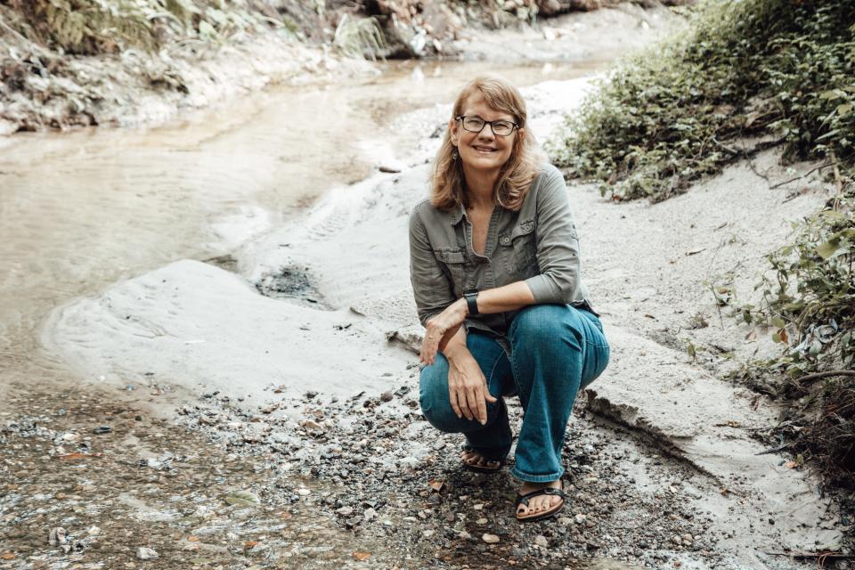 Cynthia Barnett near the creek in Loblolly Park, close to her Gainesville home.
