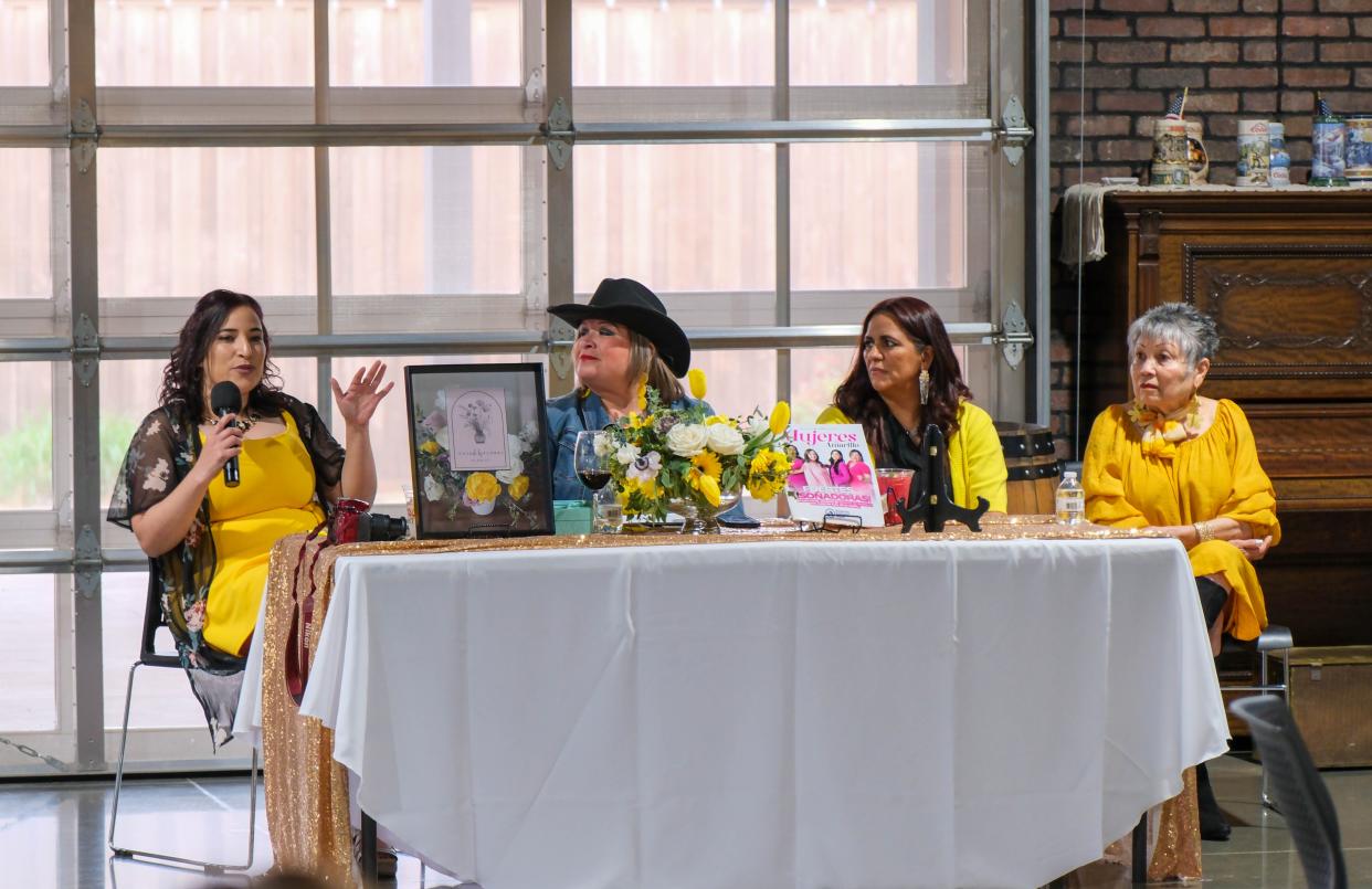 A member of the panel addresses those in attendance at AM de Amarillo's Mujeres de Amarillo (women in yellow) event last weekend in east Amarillo.