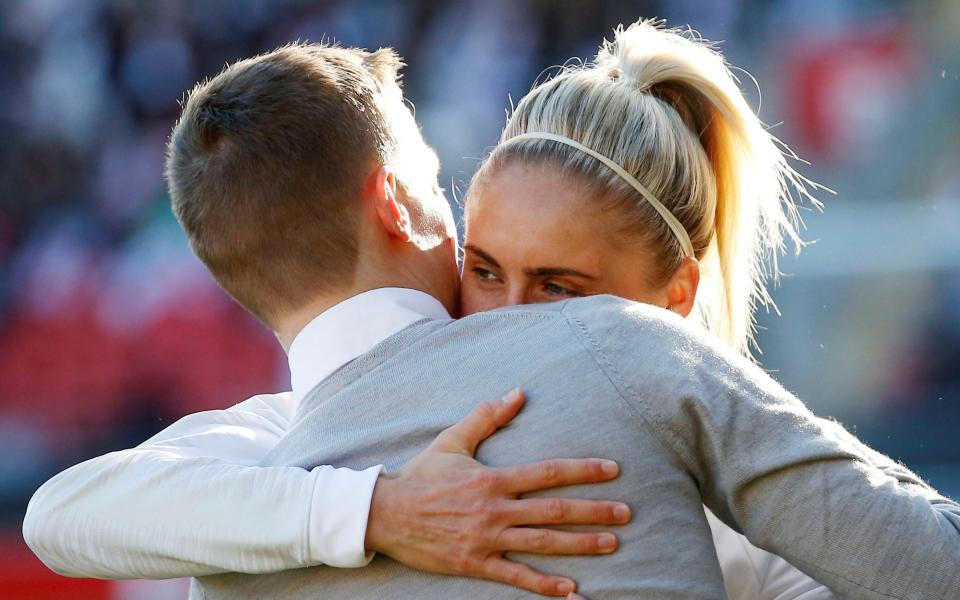 Steph Houghton hugs her husband Stephen Darby