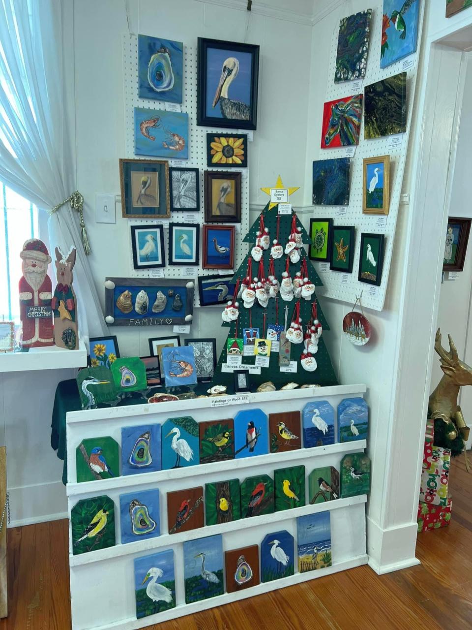 Hand-painted Santa oyster shells and other one-of-a-kind art are available at Downtown Art Gallery 630 in Houma.