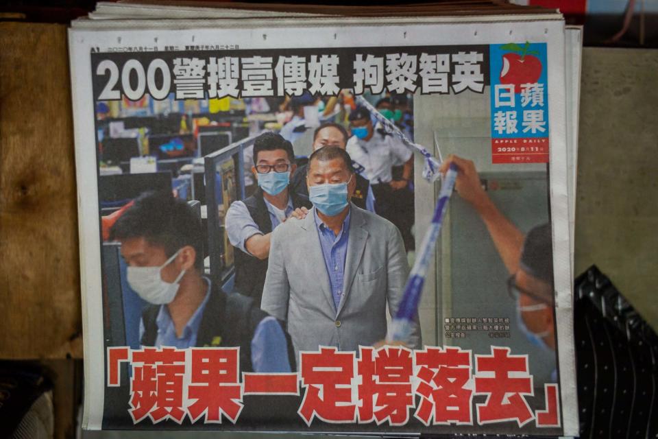 An Apple Daily newspaper is seen featuring arrested media mogul Jimmy Lai: Getty Images