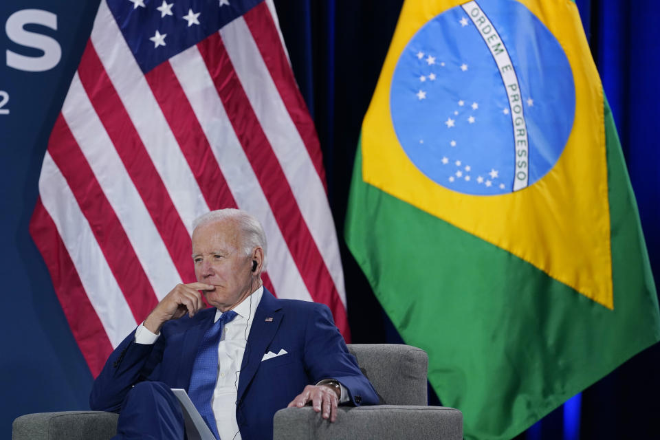 FILE - President Joe Biden listens at a meeting with Brazilian President Jair Bolsonaro during the Summit of the Americas, June 9, 2022, in Los Angeles. This past week as Biden played host at the Summit of the Americas his decision to exclude leaders he considers dictators generated considerable drama and prompted a number of other world leaders to boycott the event. (AP Photo/Evan Vucci, File)