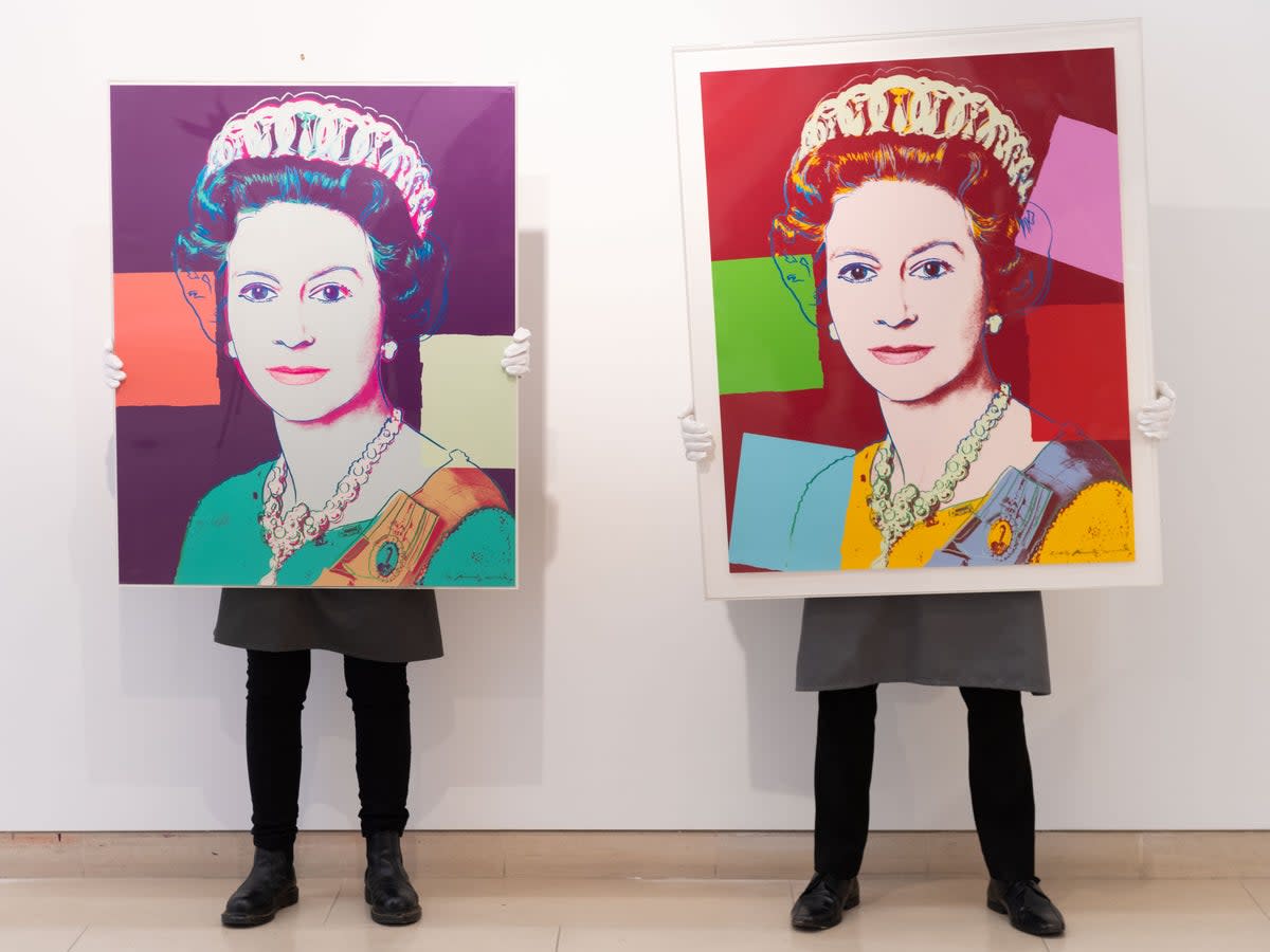 Reigning Queens by Andy Warhol is displayed during preparations for online sales at Christie’s Auction House on 26 March 2021 (Ian Gavan/Getty)