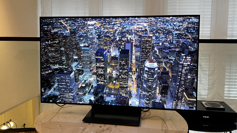Samsung S90D 48-inch OLED TV on a wooden table