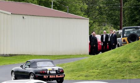 Mourners attend a funeral for six members of the Rhoden family, who were shot to death in rural Pike County on April 22, at Dry Run Church of Christ in West Portsmouth, Ohio, U.S. May 3, 2016. REUTERS/Kyle Grillot