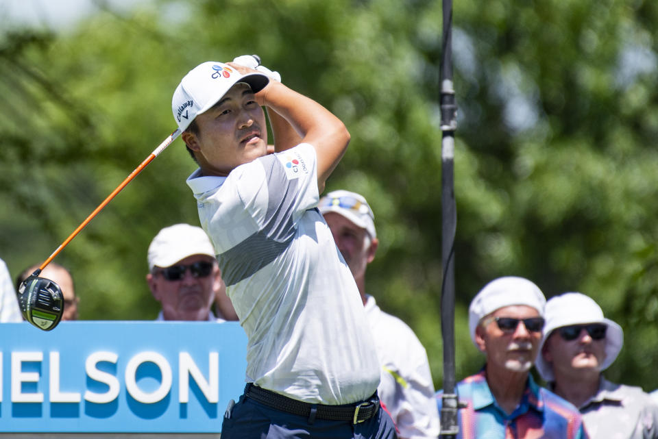 K.H. Lee, of South Korea, tees off on the second hole during the first round of the AT&T Byron Nelson golf tournament in McKinney, Texas, on Thursday, May 12, 2022. (AP Photo/Emil Lippe)
