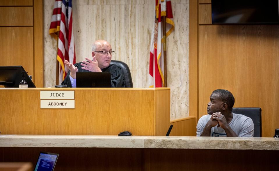 Judge J. Kevin Abdoney questions Jarvis Collins during Marcelle Waldon's first-degree murder trial Thursday. Abdoney had to command Collins to stop several times when he offered rambling or confused answers to questions that were largely yes or no.