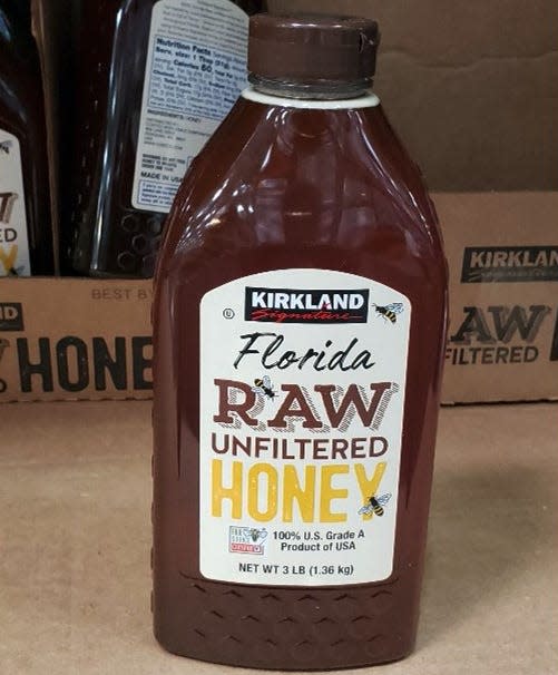 Bottle of Kirkland raw honey at Costco