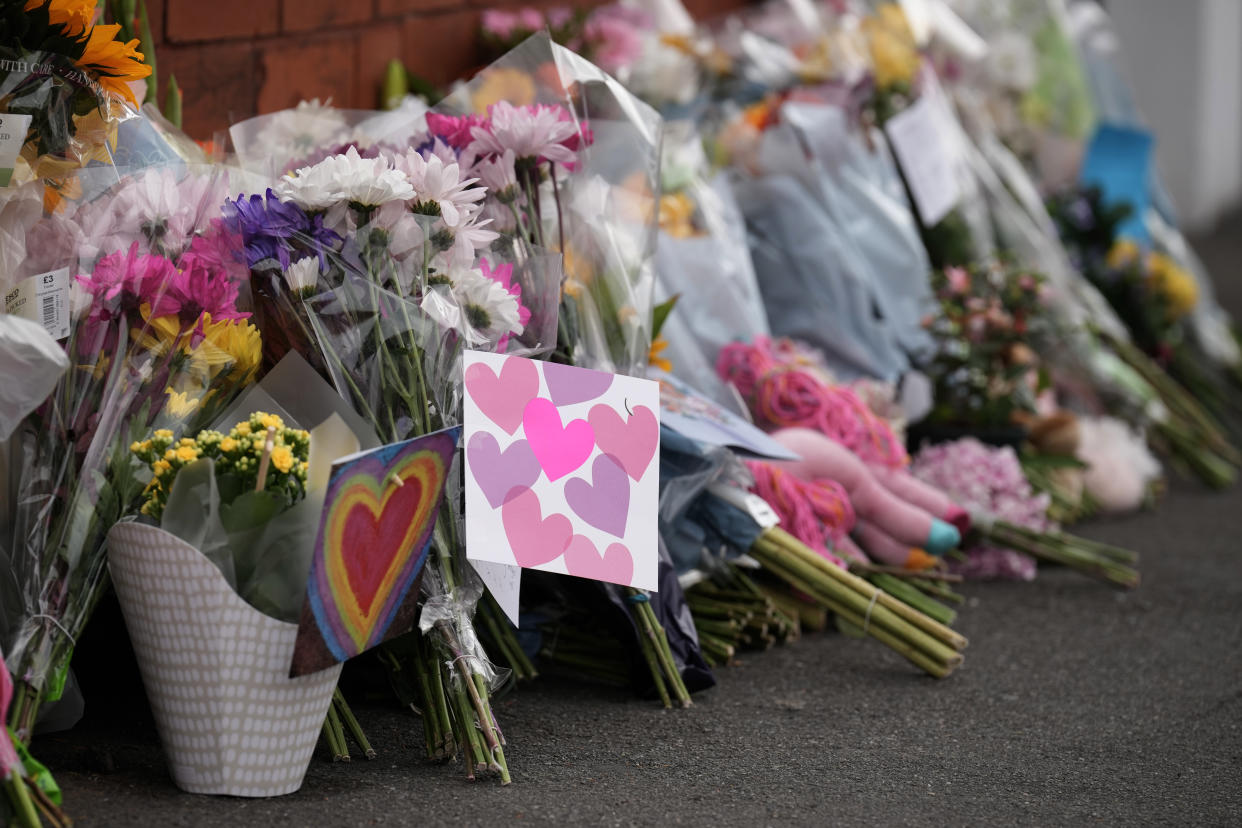 SOUTHPORT, ENGLAND - JULY 30: Tributes to the victims are left by wellwishers on July 30, 2024 in Southport, England. A teenager armed with a knife attacked children at a Taylor Swift-themed holiday club in Hart Lane, Southport yesterday morning. Two children have died and six children and two adults remain in a critical condition in hospital. A 17-year-old boy has been arrested. (Photo by Christopher Furlong/Getty Images)