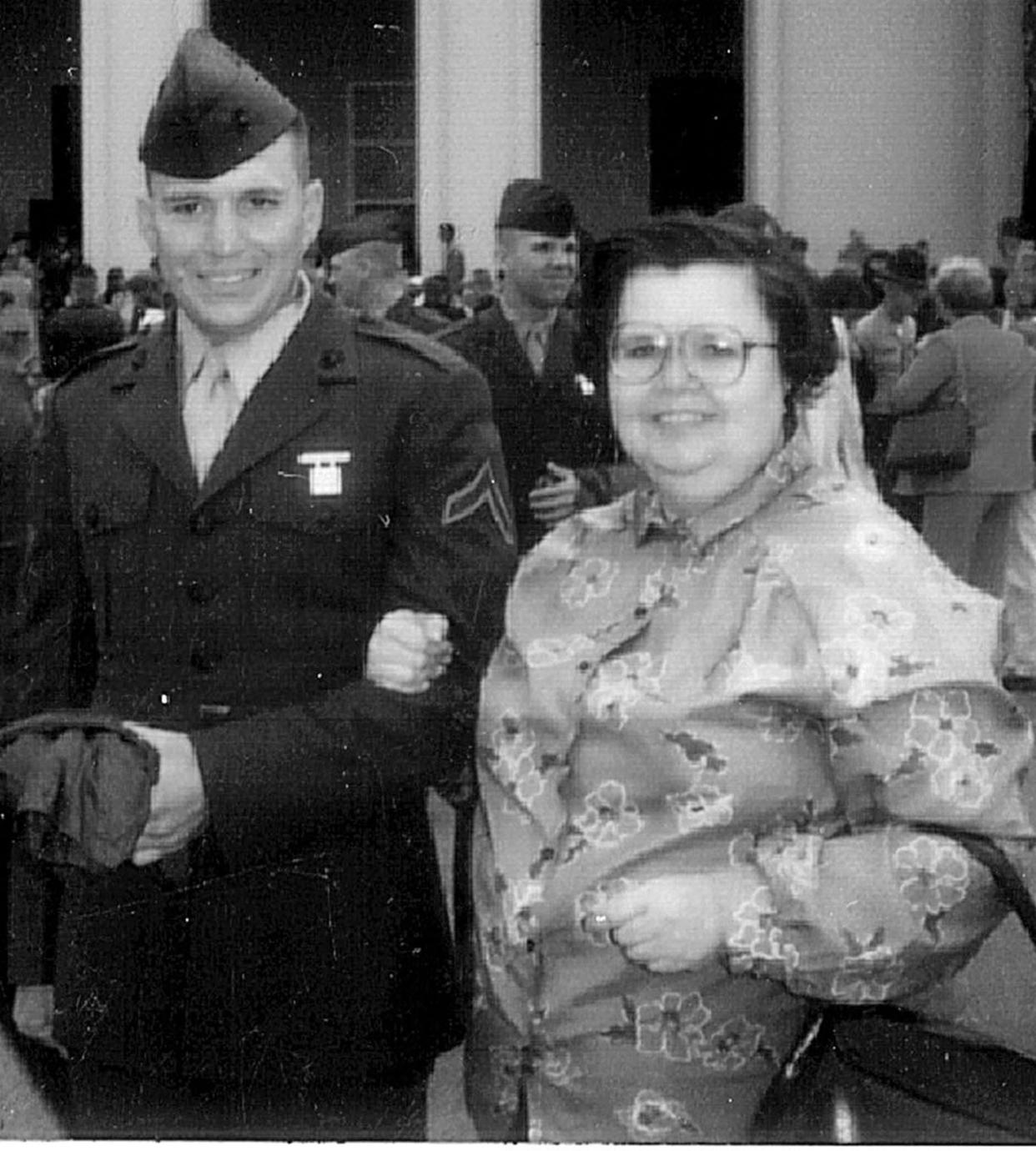 New U.S. Marine Mike Tupa poses with his mother at Boot Camp at the Marine Corps Recruit Depot in San Diego.