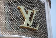 FILE PHOTO: Louis Vuitton logo outside a store in Paris