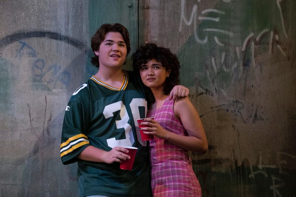 Nate (Maxwell Acee Donovan, left, with Sam Morelos as Nikki) wears a 1995 Green Bay Packers William Henderson jersey in the pilot episode of "That ‘90s Show."