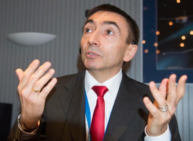 Michel Denis, French ExoMars Flight Director, reacts in front of the main control room of the European Space Agency (ESA) prior to the expected landing in Darmstadt, Germany, on October 19, 2016