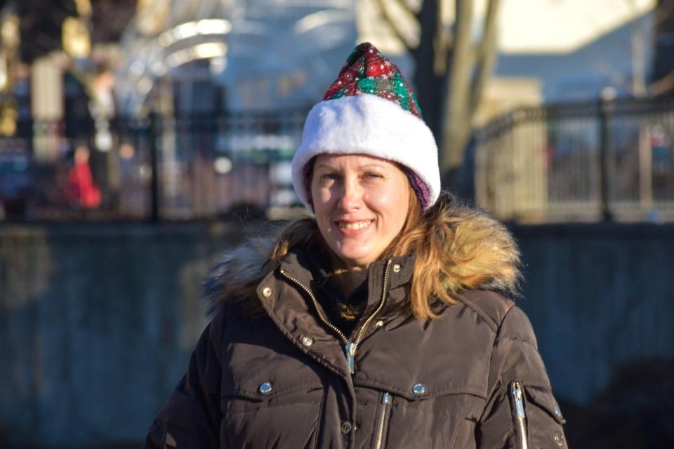Mirjam Conigliaro walked with Waukesha State Bank in the parade this year. She witnessed last year's tragedy, helping an Xtreme Dance Team member get to the hospital.