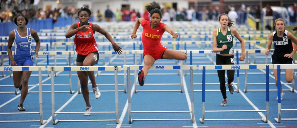 Delesha Conquest, of Glasgow, clears the last barrier to win the 100 meter girls high hurdles at the 2010 Meet of Champions.