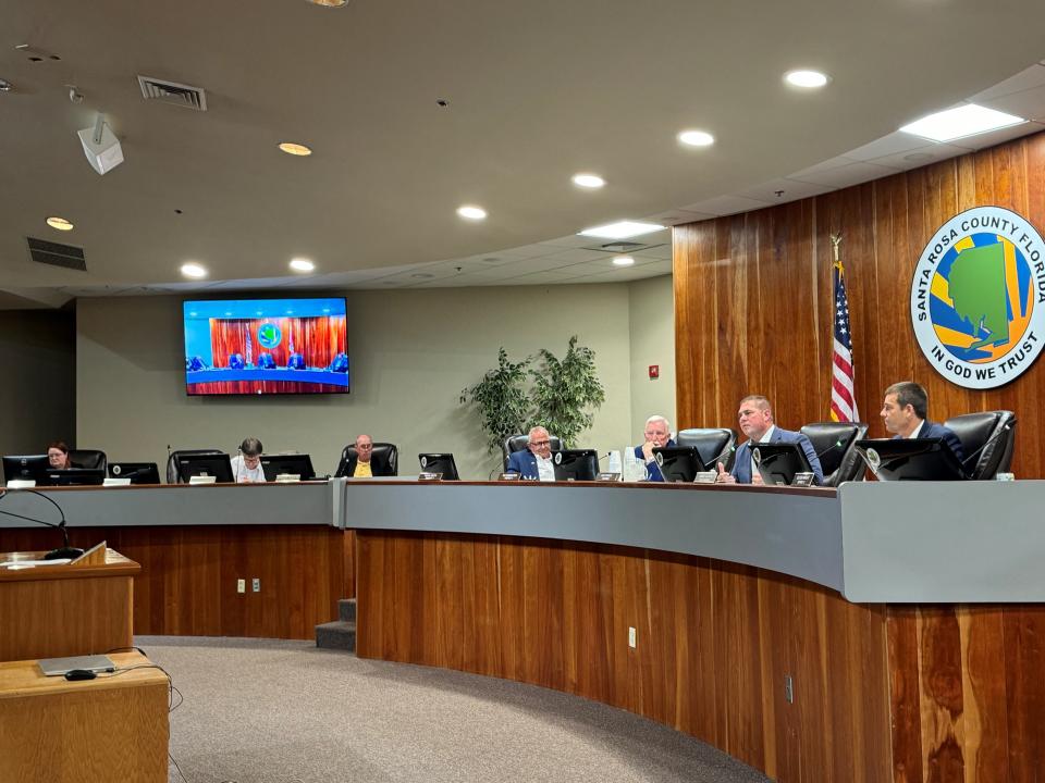 Santa Rosa County commissioners debate a resolution stating the county doesn't welcome unlawful immigrants on June 24, 2024.