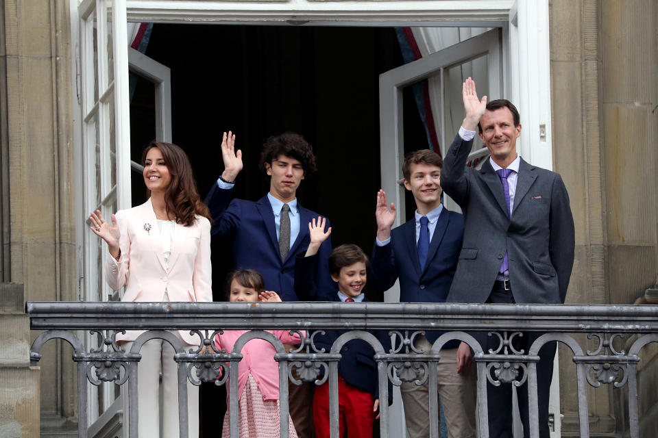 COPENHAGEN, DENMARK - APRIL 16: Prince Joachim (R) and his wife Princess Marie (L) together with their children appears at the balcony of the Royal residence, Amalienborg  Palace, on the occasion of her 78th birthday of Queen Margrethe of Denmark on April 16, 2018 in Copenhagen, Denmark. Hundreds of Copenhageners, tourists and in particular kindergarten children attended the event and as tradition commends the children shouted again and again: 'Queen, Queen come forward'. And then first the Queen comes, a little later rest of the family. (Photo by Ole Jensen - Corbis/Corbis via Getty Images)