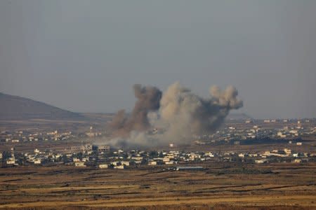 Smoke rises from Quneitra area, Syria July 16, 2018. REUTERS/ Alaa al Faqir/File Photo