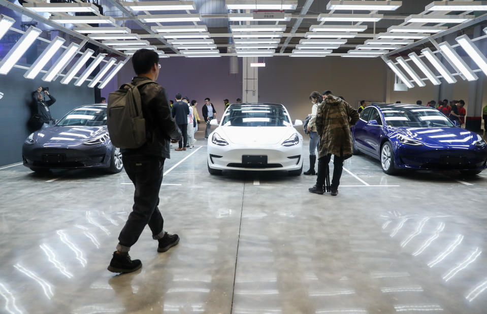 SHANGHAI, Jan. 7, 2020 -- Photo taken on Jan. 7, 2020 shows Tesla China-made Model 3 vehicles at its gigafactory in Shanghai, east China.   U.S. electric carmaker Tesla officially delivered the first batch of 10 made-in-China Model 3 sedans to the public Tuesday afternoon, one year after the company broke ground on its first overseas plant. The company also announced the launch of a project to manufacture Model Y vehicles in its Shanghai gigafactory. (Photo by Ding Ting/Xinhua via Getty) (Xinhua/Ding Ting via Getty Images)