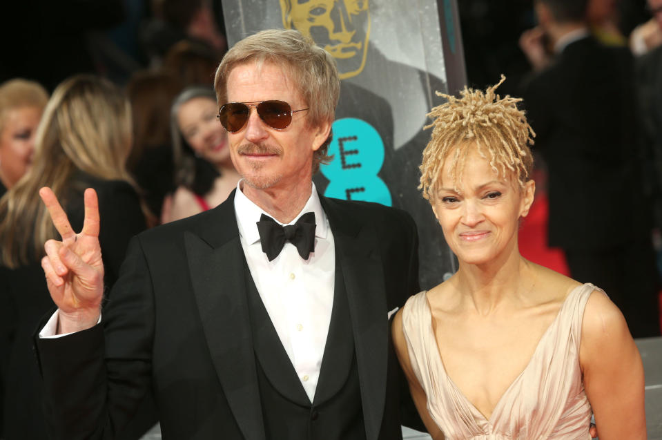 Actor Matthew Modine and his wife Caridad Rivera poses for photographers on the red carpet at the EE British Academy Film Awards held at the Royal Opera House on Sunday Feb. 16, 2014, in London. (Photo by Joel Ryan/Invision/AP)