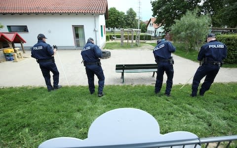 German police officers search neighbouring property around the house of District President of Kassel Walter Luebcke, who was found dead, in Wolfhagen-Istha near Kassel, Germany, June 3, 2019.  - Credit: Reuters