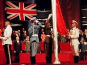 The Chinese flag is raised by People's Liberation Army soldiers to signal Hong Kong's return to Chinese sovereignty after 156 years of British rule, in Hong Kong, July 1, 1997. Negotiations over the future of Hong Kong took years before a treaty was signed in 1984 to return the territory at midnight on June 30, 1997. More than 4,000 PLA troops crossed the border into Hong Kong. Since then the garrison has tended to maintain a low profile in the city. REUTERS/Dylan Martinez/File photo