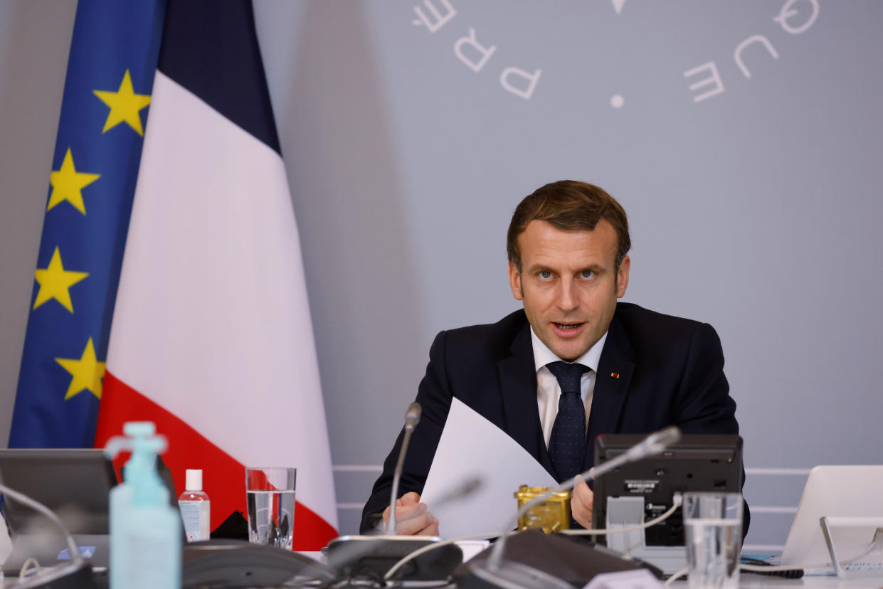 French President Emmanuel Macron speaks during a videoconference with representatives of the sporting world at the Elysee Palace in Paris, Tuesday, Nov. 17, 2020. (Ludovic Marin, Pool via AP)